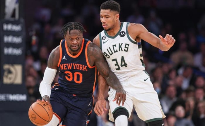 Randle (30) guarded by Bucks star Giannis Antetokounmpo